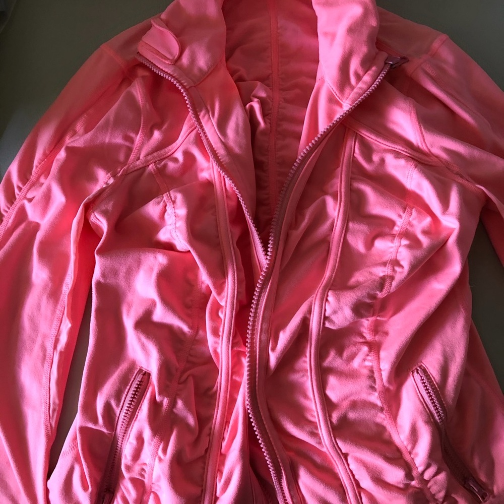 Adorable pink athletic jacket.